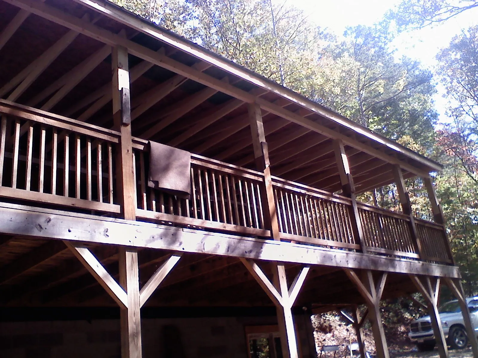 Timber framing under a new elevated porch and deck — Roof Leak Repair in Wallowa by Roofing Brothers